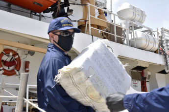 USS Kidd, U.S. Coast Guard, Apprehend Three Smugglers in the Caribbean Sea