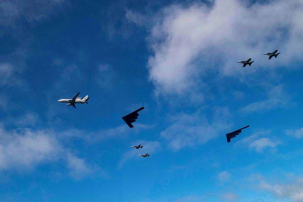 Two U.S. Air Force B-2 Spirit stealth bombers, assigned to the 509th Bomb Wing, Whiteman Air Force Base, Missouri, fly alongside Royal Australian Air Force E-7A and F/A-18 aircraft in August 2022, following a one-month Bomber Task Force deployment to Amberley, Australia. (Photo: Courtesy of Royal Australian Air Force)