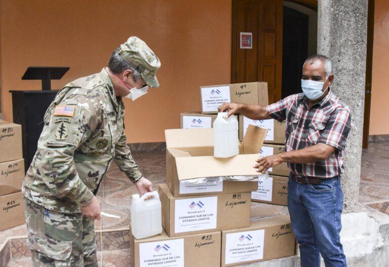 U.S. Army Colonel John Litchfield, Joint Task Force Bravo commander, unboxes medical supplies with Francisco Méndez, mayor of Lejamaní, a municipality in the department of Comayagua, Honduras, August 11, 2020. The donation was part of four different deliveries in the departments of La Paz and Comayagua, which included personal protective equipment and medical supplies, provided under SOUTHCOM’s HAP to aid local health professionals in the fight against COVID-19 in the region. (Photo: Maria Pinel/Joint Task Force Bravo)