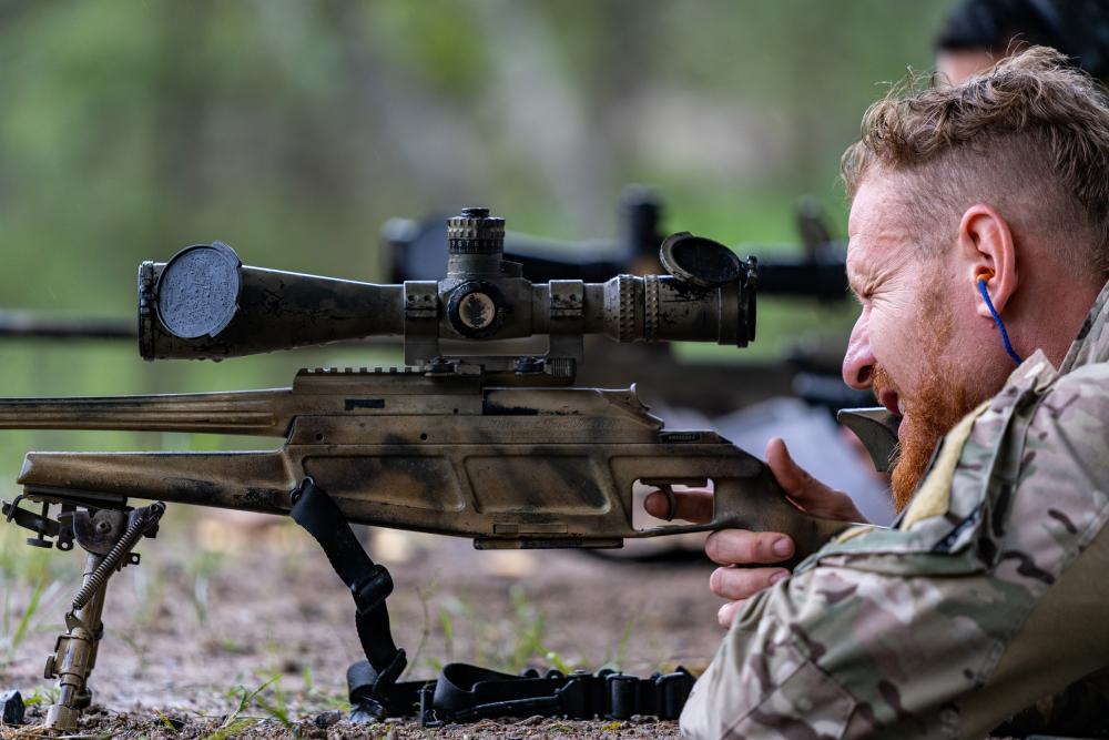 A Brazilian sniper aims in on his sniper rifle during the Sniper Skill Event as part of the Fuerzas Comando 2022 team assault course on June 15, 2022, in La Venta, Honduras. (Photo: U.S. Air Force Technical Sergeant Lionel Castellano)
