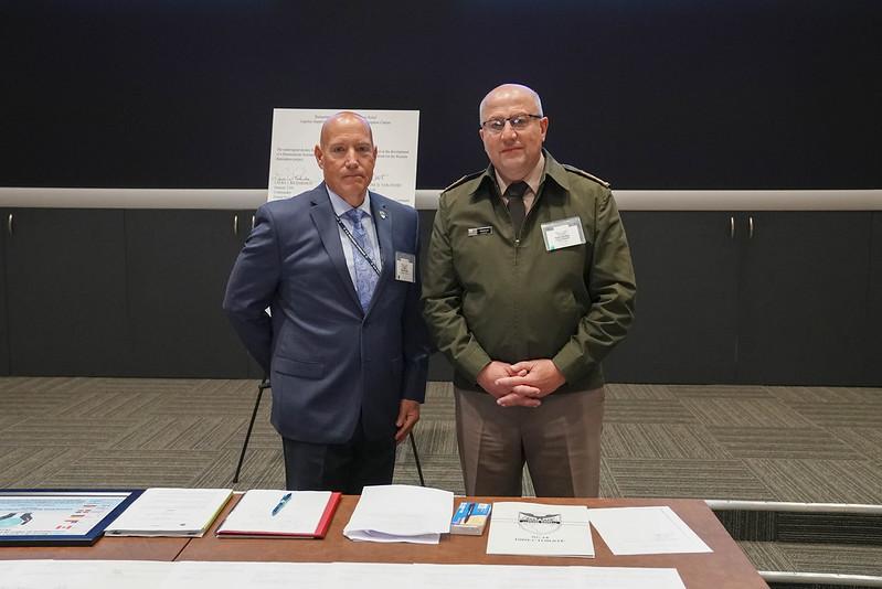 Steven Carro (L), chief of Logistics Engagement Branch, U.S. Southern Command J4, and Army Major General Hugo D. Rebollo, director of Sanitation of the Uruguayan Defense Force, stand side by side during the Senior Leader Logistics Symposium carried in early September 2023. (Photo: U.S. Southern Command Public Affairs)