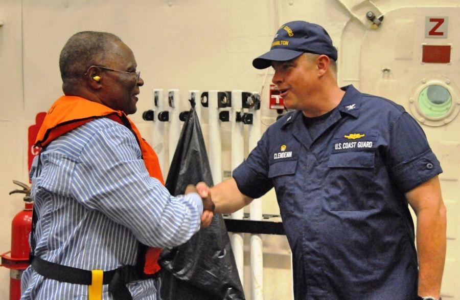U.S. Coast Guard Captain Scott Clendenin, commanding officer of the U.S. Coast Guard Cutter Hamilton, homeported in Charleston, South Carolina, welcomes the Haitian President Jocelerme Privert aboard the Hamilton after its arrival to the Haitian coast on October 8. The Hamilton crew transported disaster-relief supplies in support of the humanitarian assistance mission undertaken to support Haiti after Hurricane Matthew. (Photo: Petty Officer 2nd Class Ashley Johnson/U.S. Coast Guard District 7) 