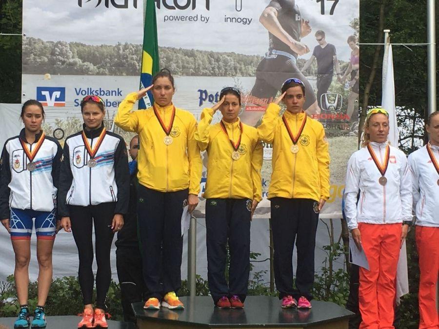 The winning women's team from the 19th Triathlon World Championships held on August 5th, in Warendorf, Germany. Finishing first place are EB Sergeant Pâmella Oliveira, EB Sergeant Beatriz Neres, and Brazilian Air Force Sergeant Vitória Lopes. (Photo: Brazilian Armed Forces Triathlon Team)