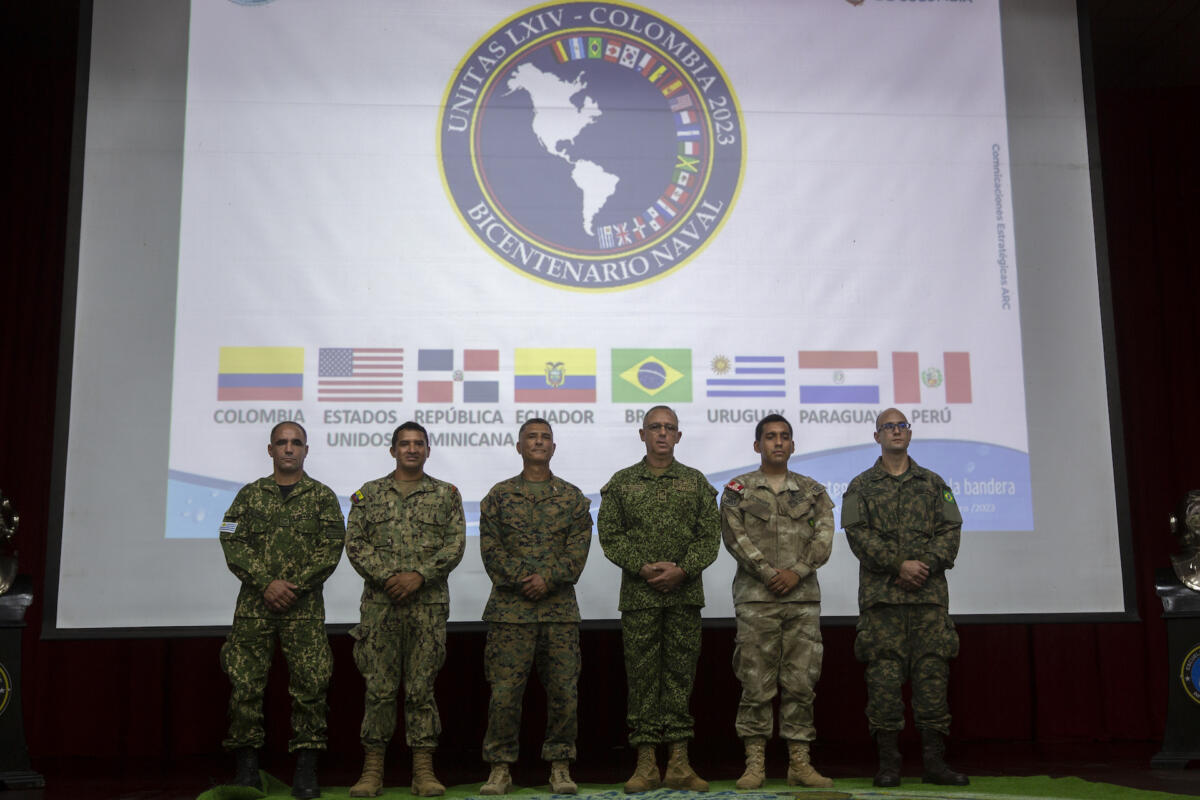 U.S. Marine Corps Colonel Guillermo Rosales, commander of Special Purpose Marine Air-Ground Task Force UNITAS LXIV, and Colombian Marine Corps Brigadier General Jorge Federico Torres Mora, commander of the Colombian Marine Corps, pose for a photo alongside partner military leaders at the Marines Training School in Coveñas, Colombia, July 12, 2023. UNITAS is the world’s longest-running annual multinational maritime exercise that brings together forces from 20 countries, including Belize, Brazil, Canada, Chile, Colombia, Dominican Republic, Ecuador, France, Germany, Honduras, Jamaica, Mexico, Panama, Paraguay, Peru, Spain, South Korea, United Kingdom, Uruguay, and the United States. (Photo: U.S. Marine Corps Lance Corporal Samuel Qin)