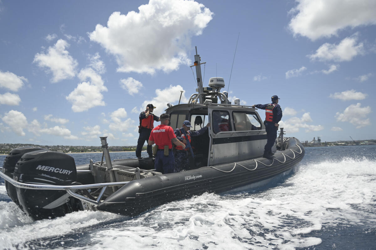 U.S. Coast Guard Maritime Law Enforcement Academy instructors and members of partner nations participate in at-sea boarding training during to counter illegal, unreported, and unregulated fishing, as part of Tradewinds 24, in Bridgetown, Barbados, May 13, 2024. (Photo: U.S. Coast Guard Petty Officer Third Class Eric Rodriguez)