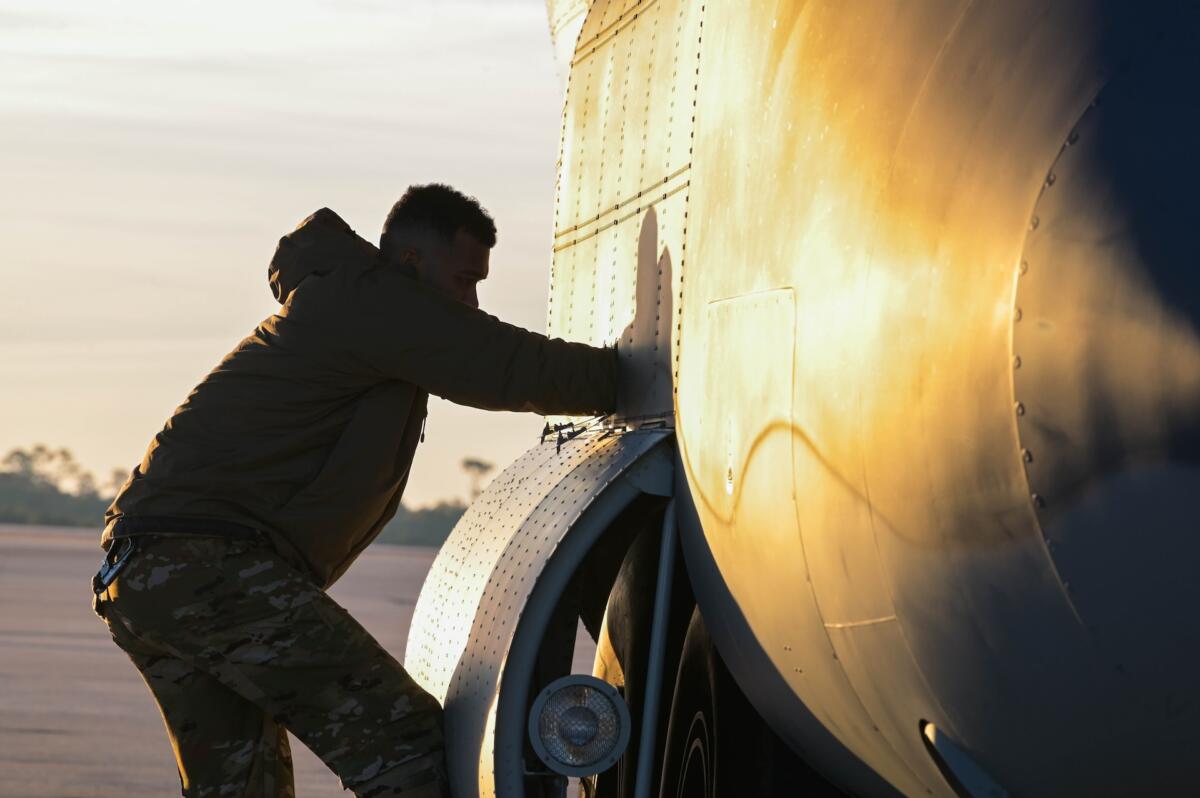 A U.S. Air Force air commando conducts a pre-flight inspection at Hurlburt Field, Florida, in preparation for a joint training exercise involving Special Operations Forces elements from the U.S Air Force, U.S. Navy and U.S. Coast Guard. The multi-service event was successfully executed on December 7, 2023, over the Southern Caribbean. (Photo: U.S. Air Force Airman First Class Ty Pilgrim) 