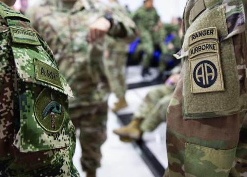 Paratroopers from the U.S. Army 82nd Airborne Division and the Colombian Army 2nd Special Forces Battalion stand next to each other during a briefing on January 24, 2020, in Tolemaida, Colombia. The U.S. and Colombian paratroopers work together as part of a Dynamic Force Exercise in support of U.S. Southern Command. (Photo: U.S. Army Master Sergeant Alexander Burnett, 82nd Airborne Division) 