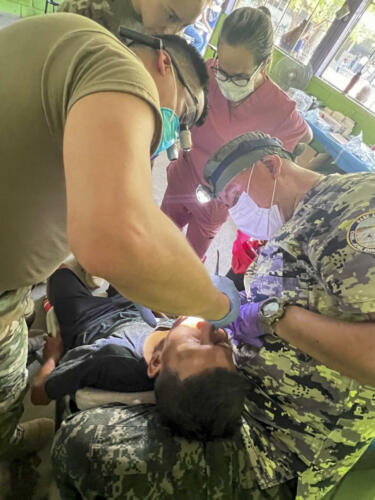 A patient receives dental treatment during a medical training and readiness exercise (MEDRETE) in Choluteca, Honduras, April 3, 2024. The MEDRETE also included members of the Honduran Ministry of Health, Honduran Armed Forces medical personnel, the program Ciudad Mujer, and local civic leaders who conducted general and preventive medicine education, dentistry treatment, and special care for women and children as part of exercise CENTAM Guardian 24 phase one. (Photo: Joint Task Force-Bravo)