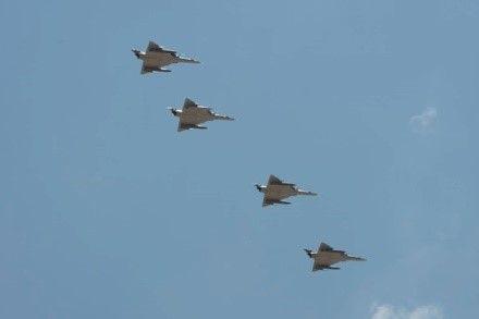 Colombian Kfir fighter jets fly in formation over Davis-Monthan Air Force Base, Arizona, July 9, 2018. The Kfirs flew an orientation flight with U.S. Air Force A-10 Thunderbolt IIs and F-16 Fighting Falcons in preparation for Red Flag 18-3. (Photo: U.S. Air Force Staff Sgt. Angela Ruiz)