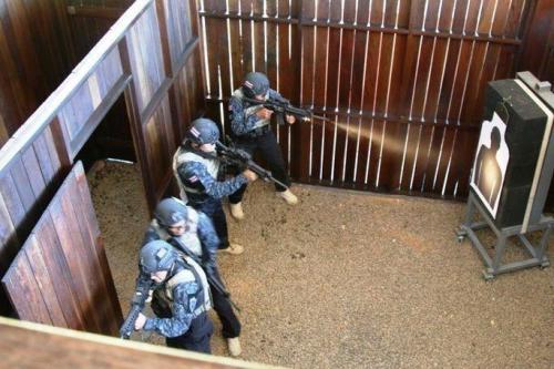 Team Costa Rica uses live ammunition during a combined assault event in which they must attempt to clear a building and rescue a hostage as efficiently as possible. (Photo: U.S. Army Sgt. 1st Class James Brown)
