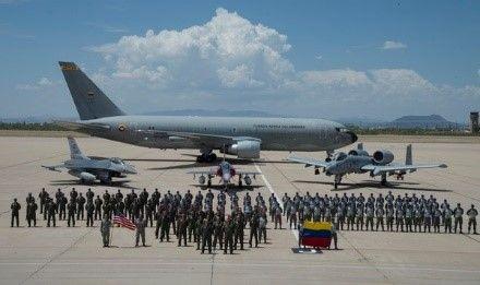 Airmen from the Colombian Air Force (FAC) and U.S. Air Force pose for a group photo in front of Colombian aircraft, a 767 Multi-Mission Tanker Transport Jupiter aircraft and a Kfir fighter jet, and U.S. Air Force aircraft, an F-16 Fighting Falcon and A-10 Thunderbolt II, on the flightline at Davis-Monthan Air Force Base, Arizona, July 13, 2018. Six Colombian Kfirs from FAC’s Combat Squadron No. 111, arrived to train with the 162nd Wing’s F-16s and the 354th Fighter Squadron’s A-10 Thunderbolt IIs in preparation for Red Flag 18-3.(Photo: U.S. Air Force Staff Sgt. Angela Ruiz
