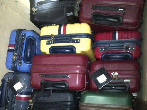 SANTO DOMINGO, Dominican Republic – Dominican counter-narcotics authorities found 680 kilograms of cocaine stashed inside 26 pieces of luggage on a Falcon 50 jet at Punta Cana airport on March 20. Authorities arrested 35 suspects in connection with the seizure. (Courtesy of DNCD)