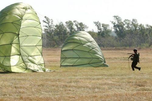A member from Team Brazil controls his parachute after jumping in Ñu Guazú, Paraguay. (Photo: U.S. Army Spc. Elizabeth Williams)